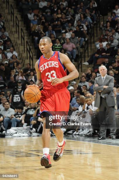 Willie Green of the Philadelphia 76ers moves the ball against the San Antonio Spurs during the game on November 29, 2009 at the AT&T Center in San...