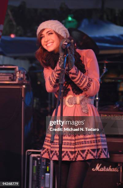 Constantine Maroulis performs during the holiday tree lighting at the New York Stock Exchange on December 10, 2009 in New York City.