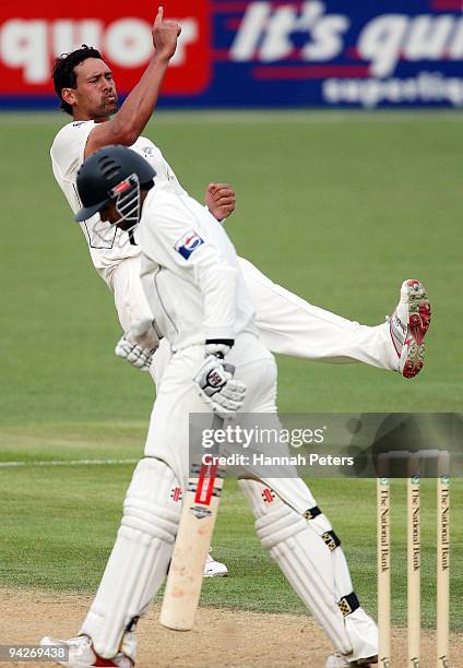 Daryl Tuffey of New Zealand celebrates the wicket of Danish Kaneria of Pakistan during day one of the Third Test match between New Zealand and...