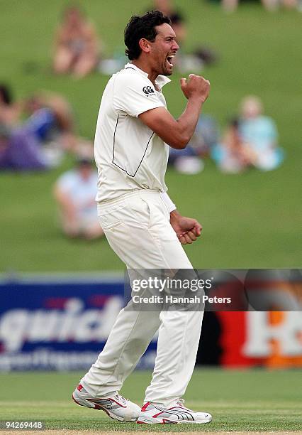 Daryl Tuffey of New Zealand celebrates the wicket of Umar Gul of Pakistan during day one of the Third Test match between New Zealand and Pakistan at...