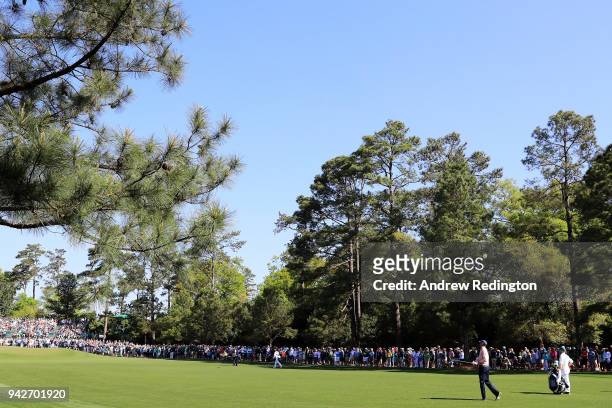 Matt Kuchar of the United States plays his third shot on the first hole during the second round of the 2018 Masters Tournament at Augusta National...