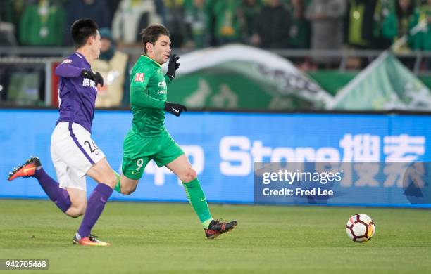 Soriano of Beijing Guoan and Cao yang of Tianjin Teda in action during the 2018 Chinese Super League match between Beijing Guoan and Tianjin Teda at...