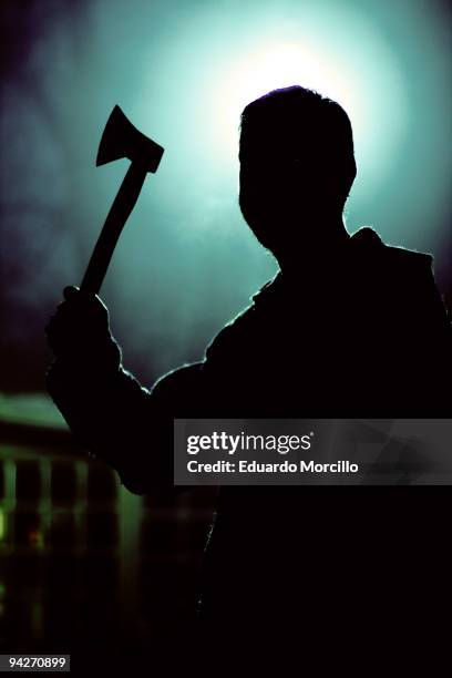 man with axe - axe stock pictures, royalty-free photos & images