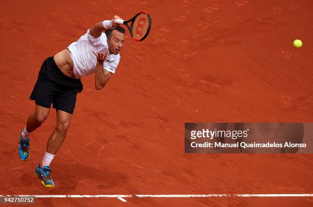 Philipp Kohlschreiber of Germany serves during his match against Rafael Nadal of Spain during day one of the Davis Cup World Group Quarter Final...