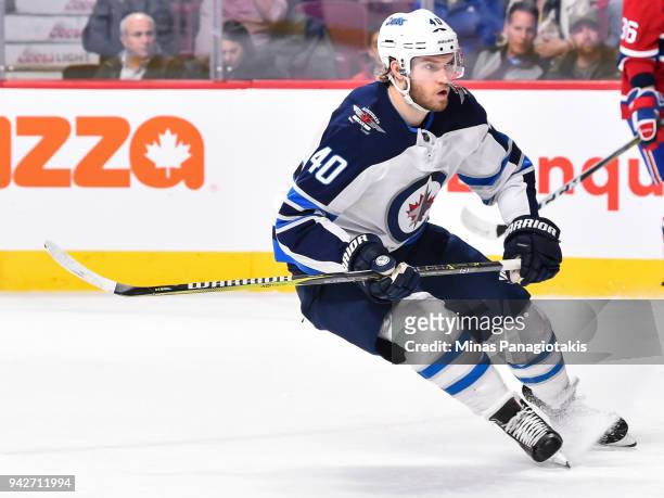 Joel Armia of the Winnipeg Jets skates against the Montreal Canadiens during the NHL game at the Bell Centre on April 3, 2018 in Montreal, Quebec,...