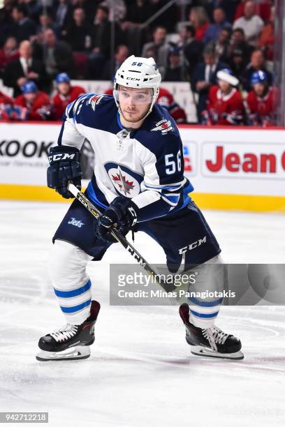 Marko Dano of the Winnipeg Jets skates against the Montreal Canadiens during the NHL game at the Bell Centre on April 3, 2018 in Montreal, Quebec,...
