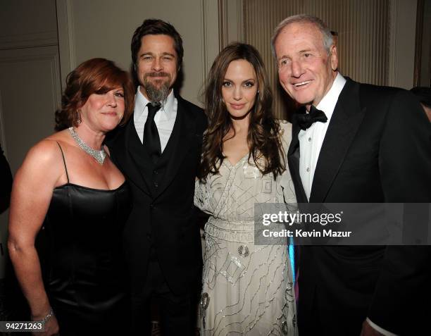 Susie Ekins, actor Brad Pitt, actress Angelina Jolie, and Jerry Weintraub attend the UNICEF Ball held at the Beverly Wilshire Hotel on December 10,...