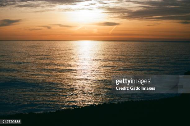 half moon bay sunset - half moon position stock pictures, royalty-free photos & images