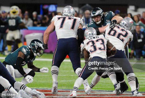 Dion Lewis of the New England Patriots carries the ball against the Philadelphia Eagles during Super Bowl LII at U.S. Bank Stadium on February 4,...