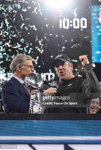 Head coach Doug Pederson of the Philadelphia Eagles with the Lombardi Trophy and commentator Dan Patrick after the Eagles defeated the New England...