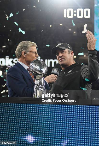 Head coach Doug Pederson of the Philadelphia Eagles with the Lombardi Trophy and commentator Dan Patrick after the Eagles defeated the New England...