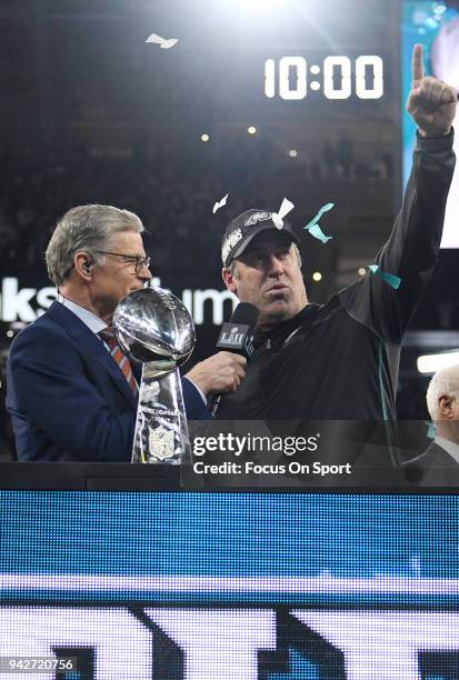 Head coach Doug Pederson of the Philadelphia Eagles with the Lombardi Trophy and commentator Dan Patrick after the Eagles defeated the New England...