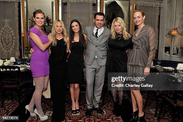 Model Heidi Klum, stylist Rachel Zoe, actress Demi Moore, designer Roland Mouret, photographer Amanda de Cadenet and actress Amber Valletta attend...