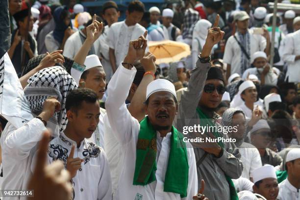 Thousands of Muslims rallied in front of the Indonesian Police Criminal Investigation Agency office, Jakarta, on Friday, April 6, 2018. The action...