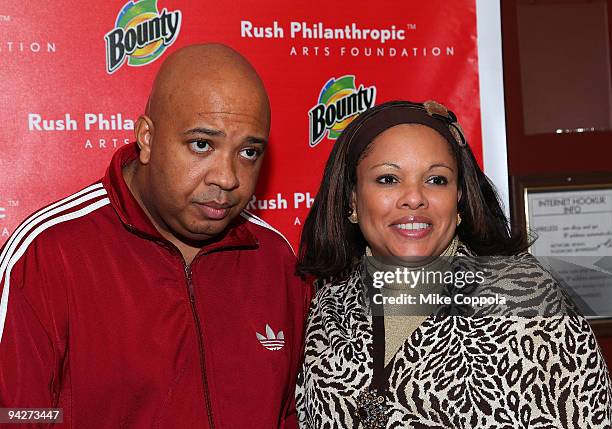 Joseph "Rev. Run" Simmons and wife Justine Simmons attend the 10th annual Rush Philanthropic Arts Foundation youth holiday party at The Fillmore New...