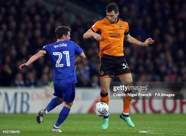 Cardiff City's Craig Bryson and Wolverhampton Wanderers's Lohner Leo Bonatini battle for the ball during the Sky Bet Championship match at the...