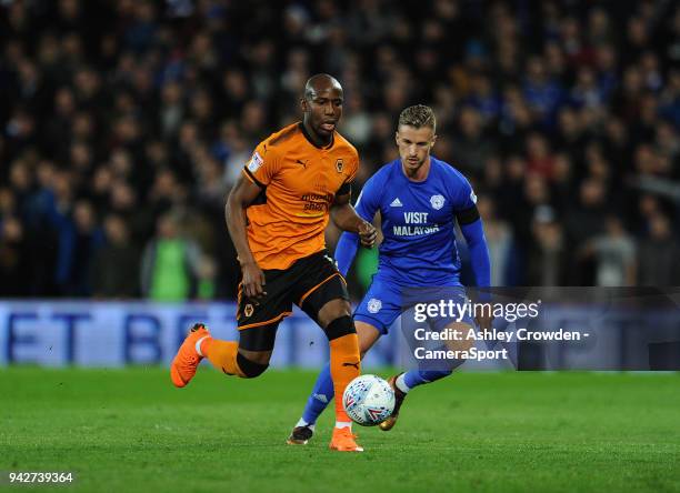 Wolverhampton Wanderers' Benik Afobe battles with Cardiff City's Joe Bennett during the Sky Bet Championship match between Cardiff City and...