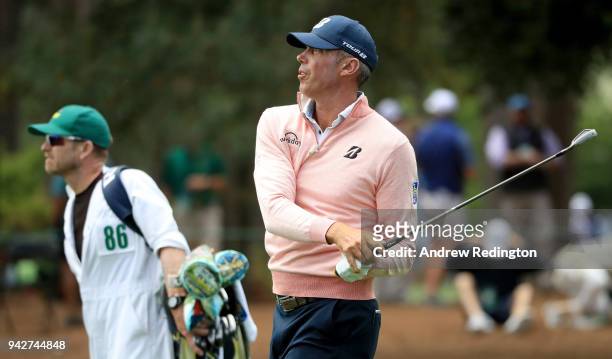 Matt Kuchar of the United States plays his second shot on the ninth hole during the second round of the 2018 Masters Tournament at Augusta National...