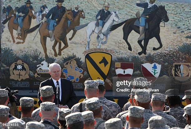 Secretary of Defense Robert Gates speaks to soldiers at F.O.B. Warrior December 11, 2009 in Kirkuk, Iraq. Secretary Gates stopped in Iraq following a...