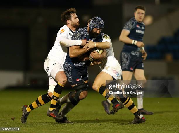 Josh Strauss of Sale is tackled by Danny Cipriani of Wasps during the Aviva Premiership match between Sale Sharks and Wasps at AJ Bell Stadium on...
