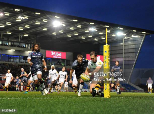 Josh Bassett of Wasps scores his second try in the corner during the Aviva Premiership match between Sale Sharks and Wasps at AJ Bell Stadium on...