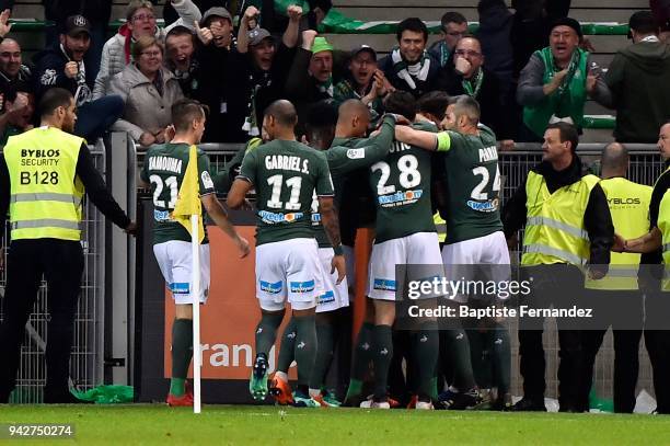 Remy Cabella of Saint Etienne celebrates with teammates during the Ligue 1 match between AS Saint-Etienne and Paris Saint Germain at Stade...