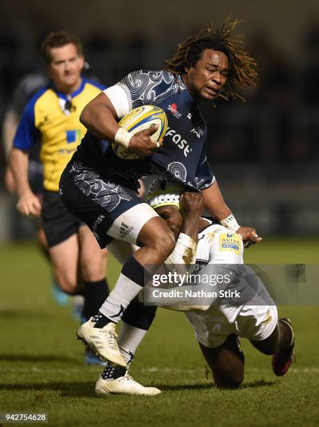 Marland Yarde of Sale is tackled by Christian Wade of Wasps during the Aviva Premiership match between Sale Sharks and Wasps at AJ Bell Stadium on...