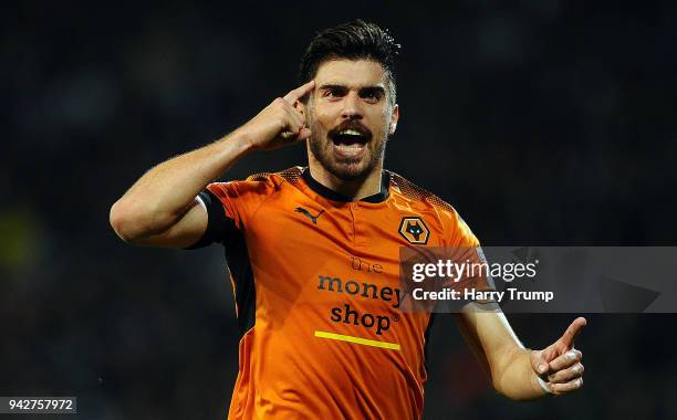 Ruben Neves of Wolverhampton Wanderers celebrates after scoring his sides first goal during the Sky Bet Championship match between Cardiff City and...