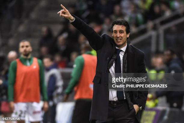 Paris Saint-Germain's Spanish headcoach Unai Emery gestures as he gives instructions during the French L1 football match between AS Saint-Etienne and...
