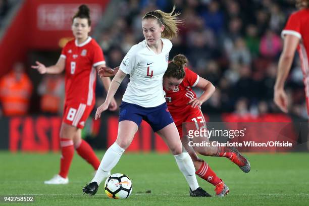 Hayley Ladd of Wales collides with Keira Walsh of England during the Womens World Cup Qualifier between England and Wales Women at St Mary's Stadium...