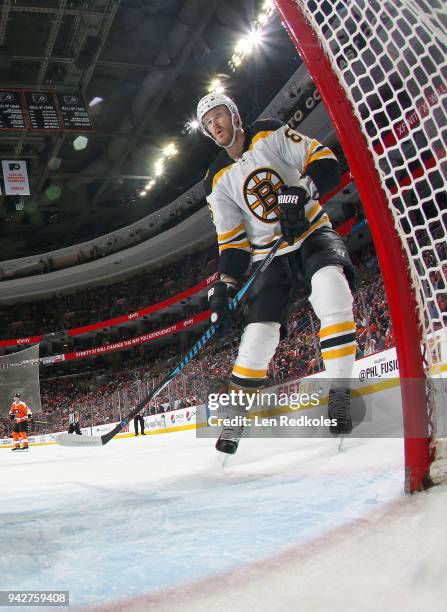 Kevan Miller of the Boston Bruins watches the play in the corner against the Philadelphia Flyers on April 1, 2018 at the Wells Fargo Center in...