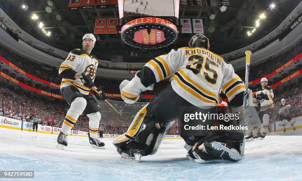 Zdeno Chara and Anton Khudobin of the Boston Bruins react to a shot on goal by the Philadelphia Flyers on April 1, 2018 at the Wells Fargo Center in...