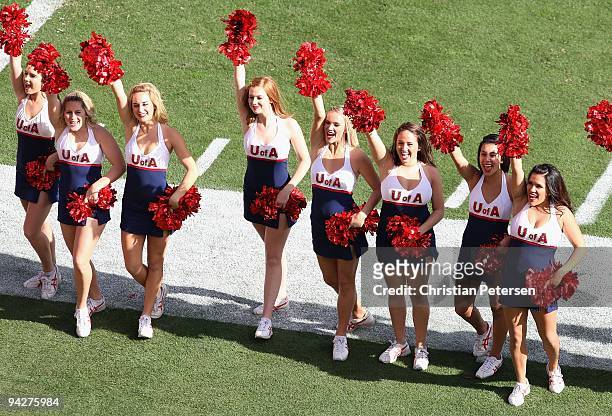 The Arizona Wildcats cheerleaders perform before the college football game against the Arizona State Sun Devils at Sun Devil Stadium on November 28,...