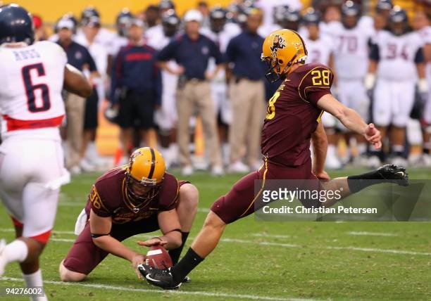 Kicker Thomas Weber of the Arizona State Sun Devils attempts a field goal against the Arizona Wildcats during the first quarter of the college...