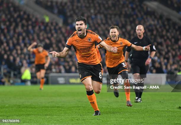 Ruben Neves of Wolverhampton Wanderers celebrates after scoring a goal to make it 0-1 during of the Sky Bet Championship match between Cardiff City...