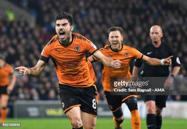 Ruben Neves of Wolverhampton Wanderers celebrates after scoring a goal to make it 0-1 during of the Sky Bet Championship match between Cardiff City...