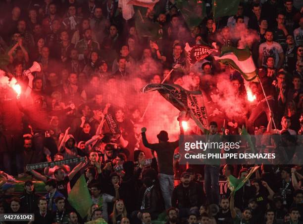 Saint-Etienne's fans cheer during the French L1 football match between AS Saint-Etienne and Paris Saint-Germain on April 6, 2018 at the...