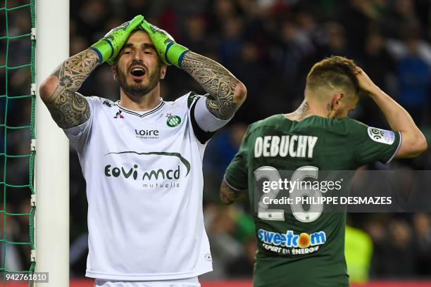 Saint-Etienne's French goalkeeper Stephane Ruffier reacts after Saint-Etienne's French defender Mathieu Debuchy scored a last minute own goal,...