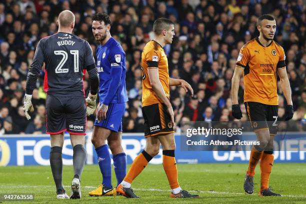 Sean Morrison of Cardiff City talks with John Ruddy of Wolverhampton Wanderers after Joe Bennett's shot on goal during the Sky Bet Championship match...