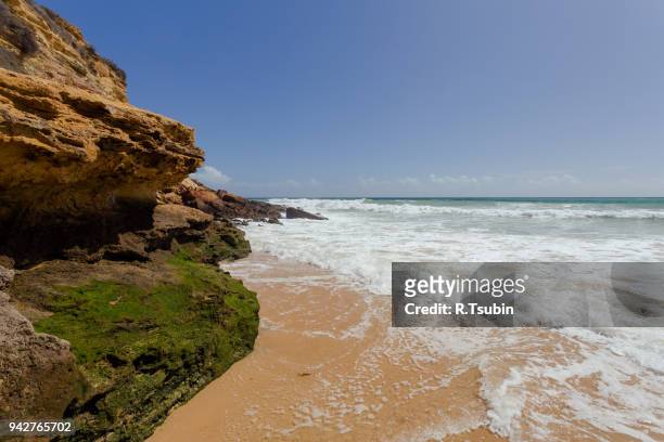 beautiful clear mediterranean sea - burgau portugal stock pictures, royalty-free photos & images