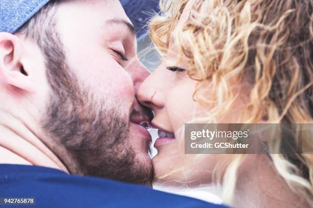 reaching in for a kiss - kissing mouth stock pictures, royalty-free photos & images