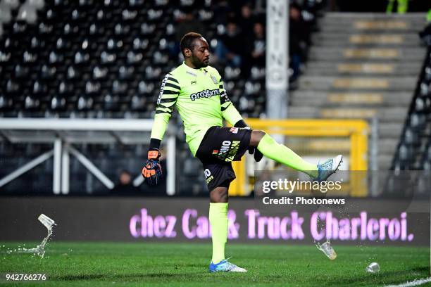 Parfait Junior Mandanda goalkeeper of Sporting Charleroi shoots at some beer cups throwing at him by RSCA supporters during the Jupiler Pro League...