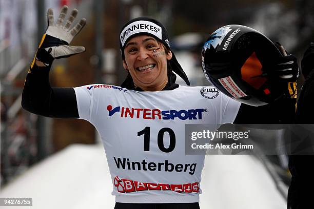 Kerstin Szymkowiak of Germany celebrates after winning the skeleton competition during the FIBT Bob & Skeleton World Cup at the bob run on December...