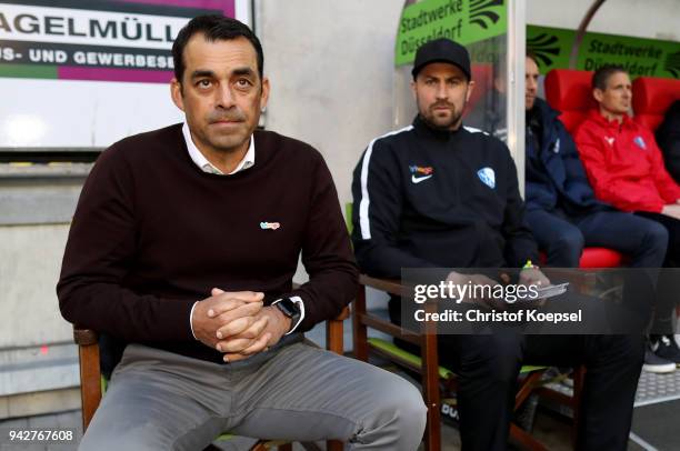 Head coach Robin Dutt and assistant coach Heiko Butscher of Bochum sit on the bench during the Second Bundesliga match between Fortuna Duesseldorf...