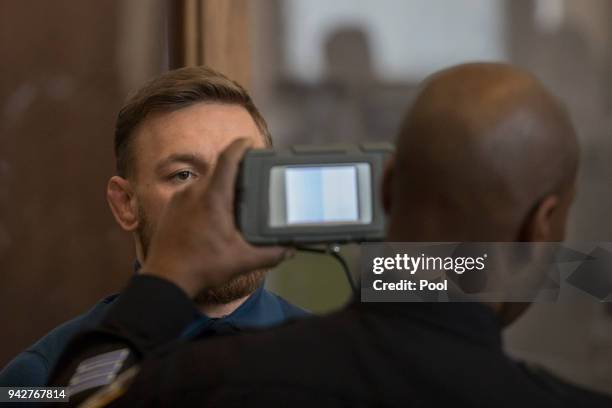 Ultimate fighting star Conor McGregor is arraigned in Brooklyn Criminal court on April 6, 2018 in New York City. McGregor is facing criminal charges...