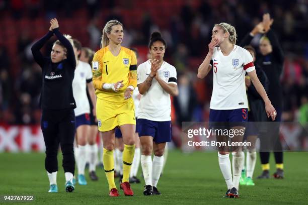 Carly Telford, Demi Stokes and Steph Houghton of England look on after the Women's World Cup Qualifier match between England and Wales at St Mary's...