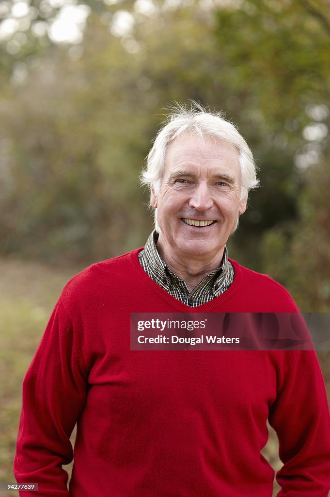 Senior man in countryside.