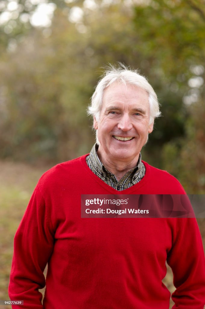 Senior man in countryside.