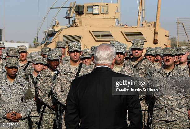 Secretary of Defense Robert Gates speaks to soldiers at F.O.B. Warrior December 11, 2009 in Kirkuk, Iraq. Secretary Gates stopped in Iraq following a...