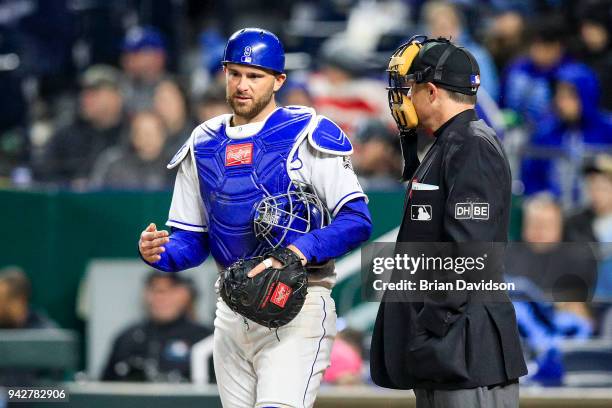 Drew Butera of the Kansas City Royals and home plate umpire Dan Iassogna talk before the sixth inning during the game against the Chicago White Sox...